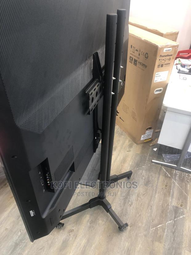 (Trolley Stand) TV Bracket With Shelf and Wheels 32-70 · Photo 1
