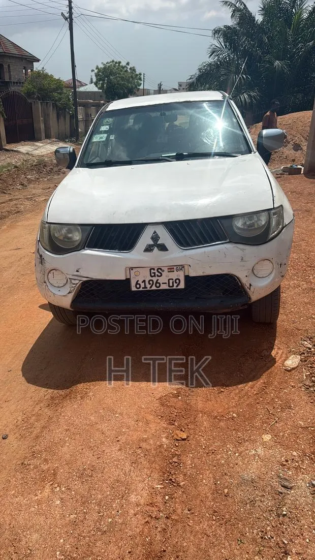 Mitsubishi L200 Double Cab 2.5 180hp 4WD 2009 White · Photo 1