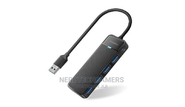 4-Port USB Hub, Idsonix USB 3.0 Hub 5gbps USB Hub for Laptop · Photo 2