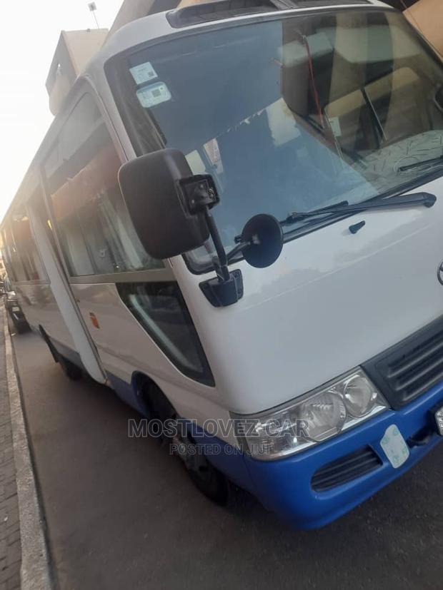 Rent a Car - Toyota Coasters Bus 30 Passengers Buses · Photo 2