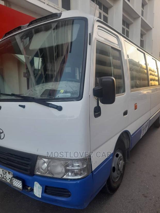 Rent a Car - Toyota Coasters Bus 30 Passengers Buses · Photo 1