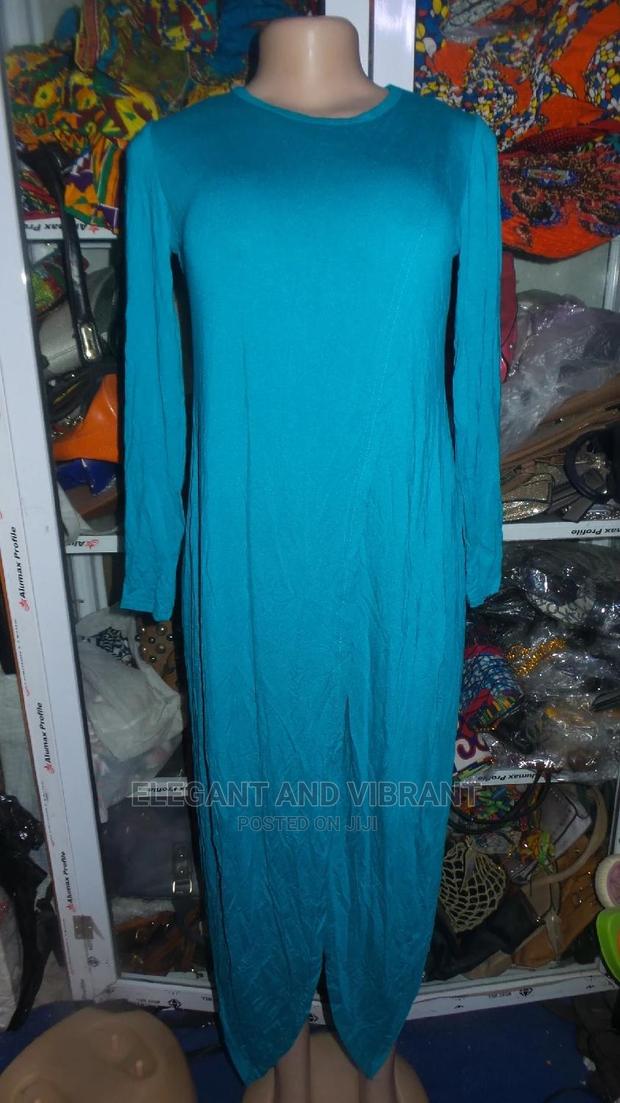 Long Stylish Dress With a Cut on the Back · Photo 1