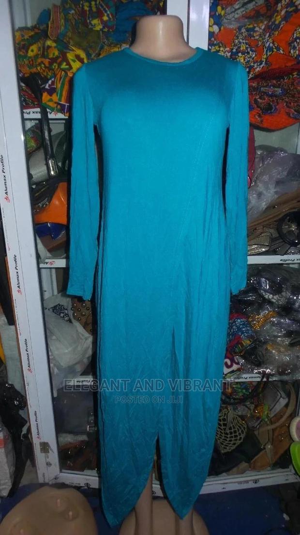 Long Stylish Dress With a Cut on the Back · Photo 2