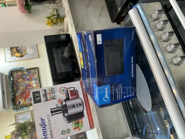 Grab Quality Midea 20ltrs Grill Microwave Silver · Photo 1