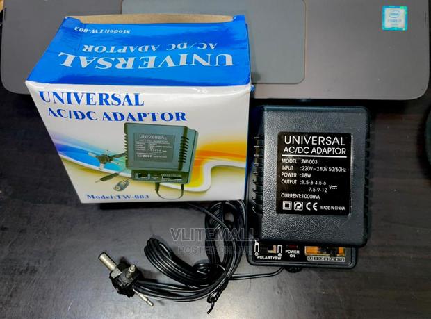 Universal Ac-Dc Power Adapter 18w 1000ma · Photo 1