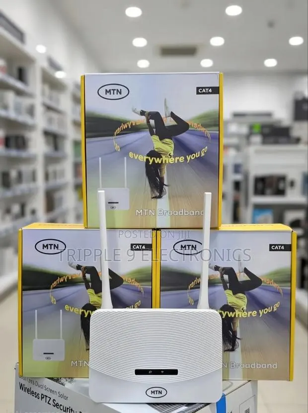 Universal Broadband Cat 4 Turbonet Router · Photo 1