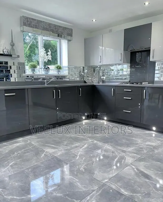 Glossy Gray Kitchen Cabinets + Fridge Microwave · Photo 1