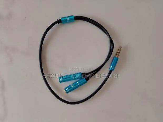 Audio Splitter Cable Or Headphone/Microphone Splitter. · Photo 1