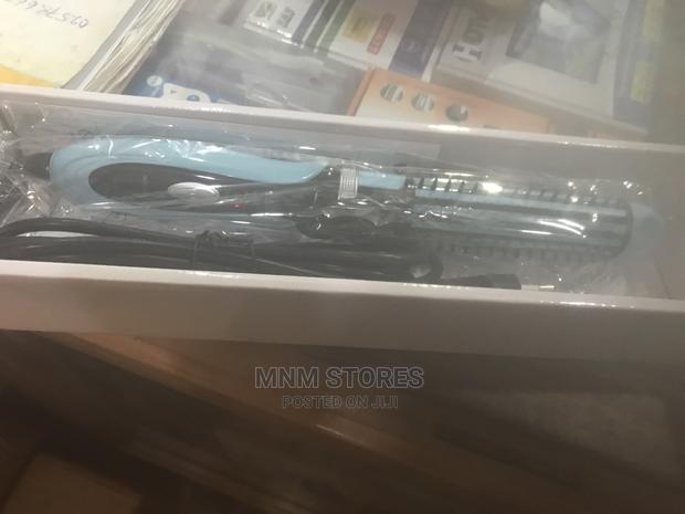 3 in 1 Sonar Hair Straightener · Photo 2