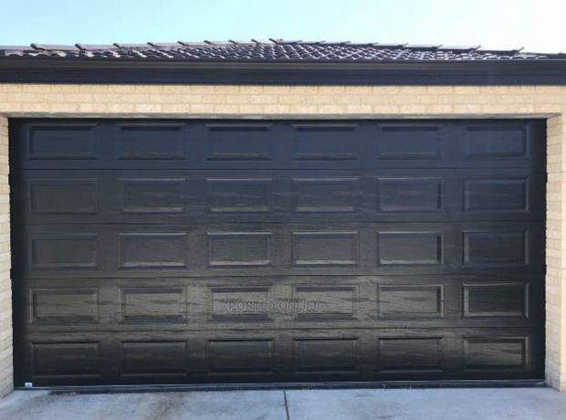 Unique Automated Remote Garage Door · Photo 4