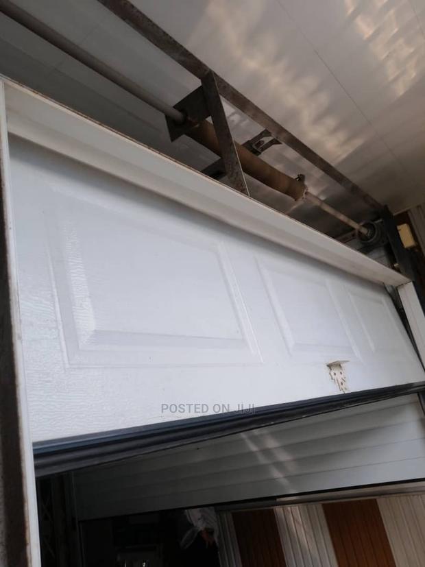 Mordern Remote Control Garage Door All Colors Available · Photo 1