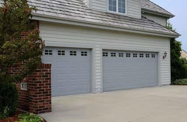 Anti Thief Remote Garage Doors in All Colors · Photo 1