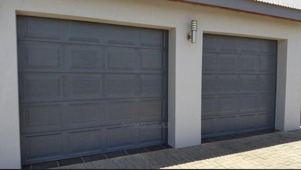 Anti Thief Remote Garage Doors in All Colors · Photo 3