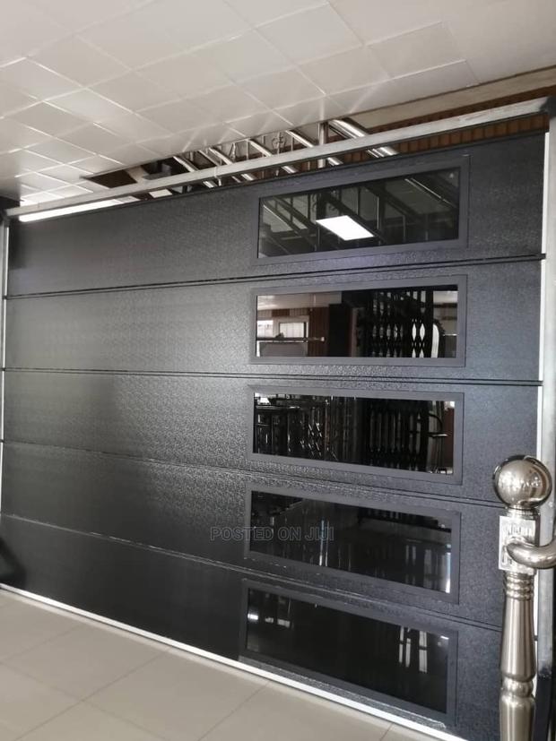 Ultra Modern Design Automatic Garage Doors · Photo 1