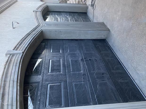 New Black Remote Garage Available · Photo 1
