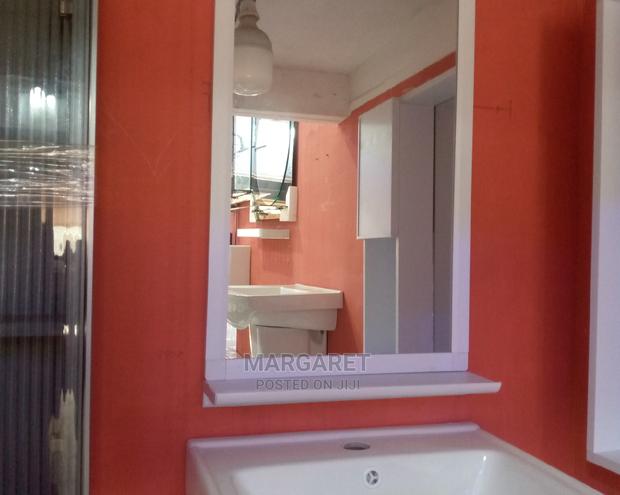 Cabinet Wash Hand Basin and Nice Mirror · Photo 1