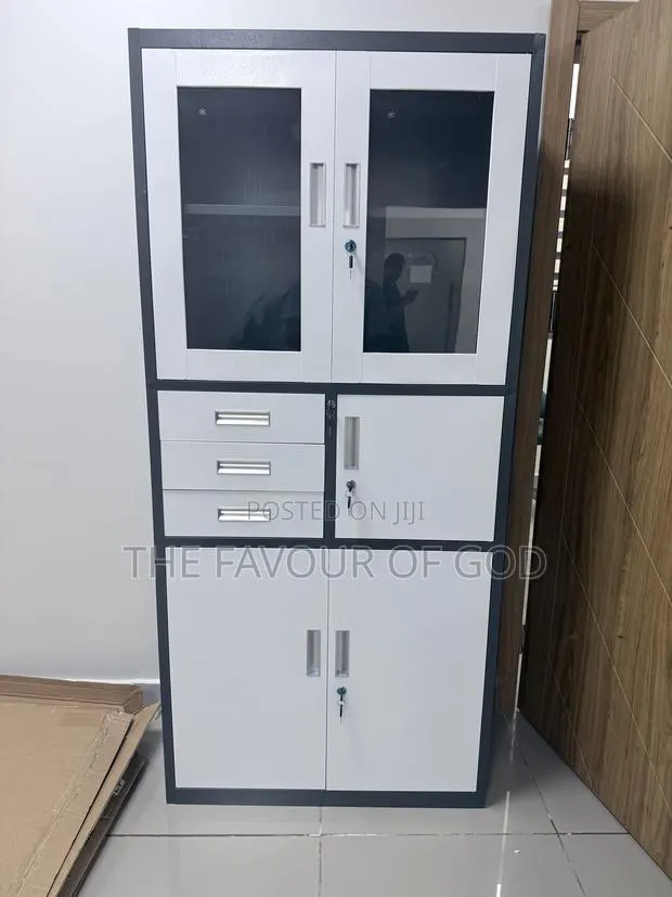 An Authentic Made Metal Cabinet With Safe · Photo 1