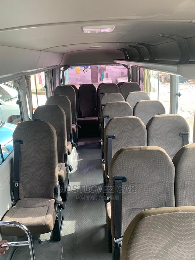 RENT a CAR- Coasters Bus With Refrigerator Luxury Bus Rental · Photo 4