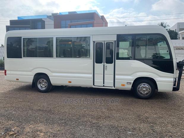 RENT a CAR- Coasters Bus With Refrigerator Luxury Bus Rental · Photo 2