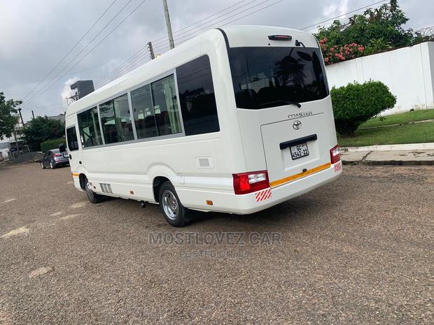 RENT a CAR- Coasters Bus With Refrigerator Luxury Bus Rental · Photo 3