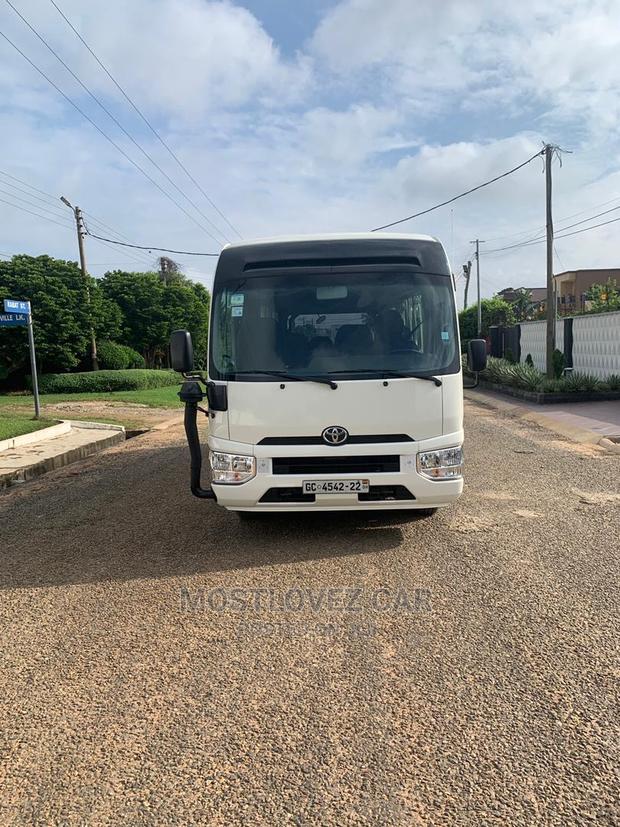 RENT a CAR- Coasters Bus With Refrigerator Luxury Bus Rental · Photo 1