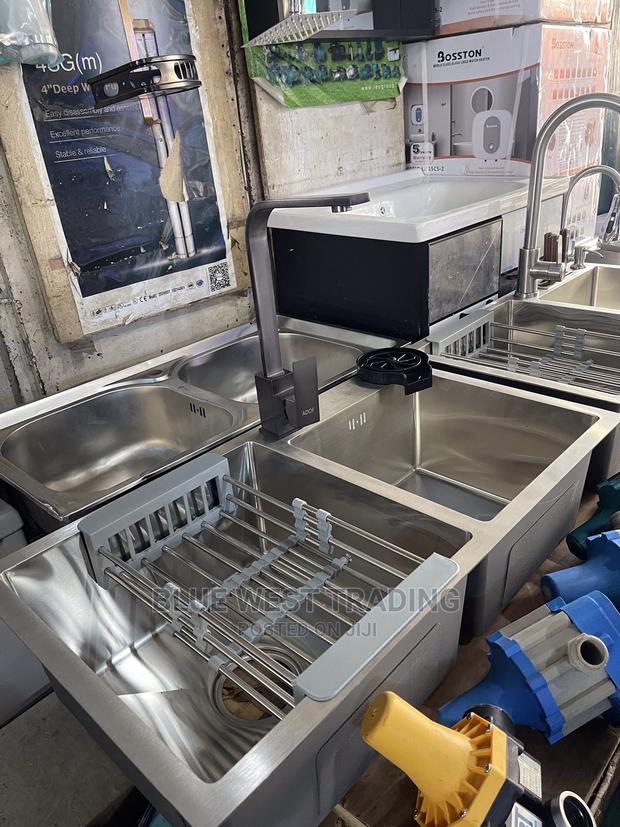 Stainless Steel Cabinet Sink With Cup Washer · Photo 1