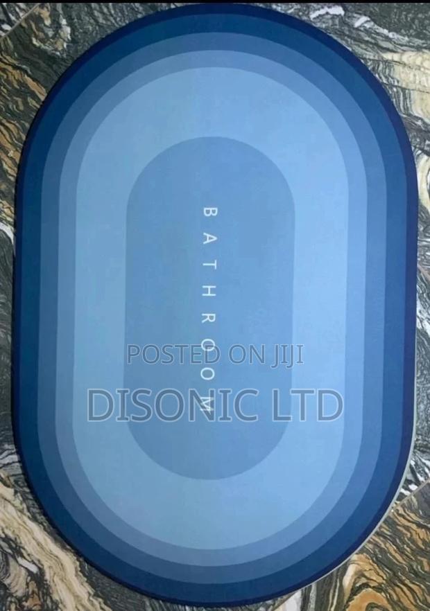 Water Absolvent Bathroom Door Mat · Photo 1
