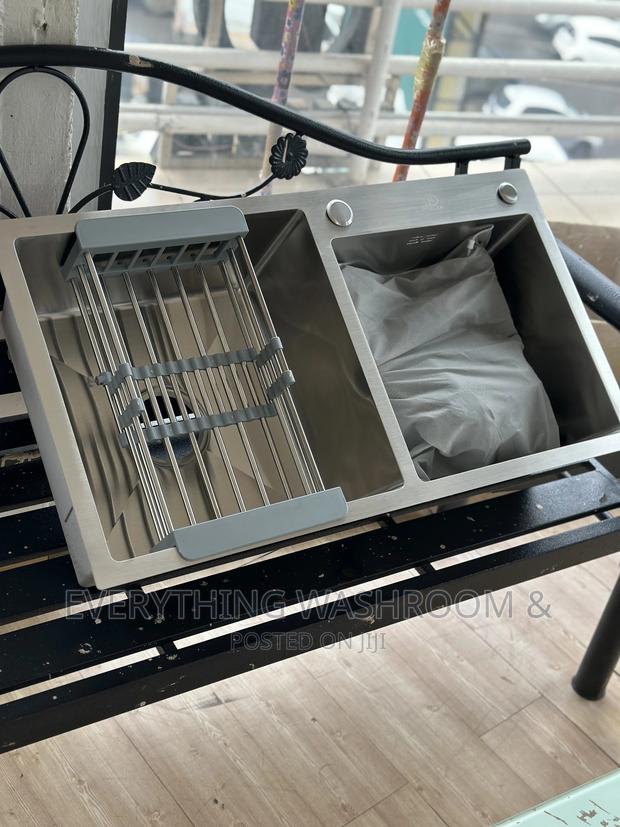 Stainless Double Bowl Kitchen Sink With Accessories · Photo 1