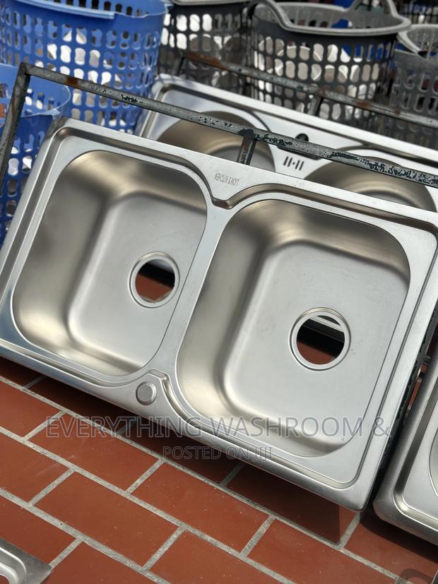 Kitchen Sink Double Bowl With Waste Accessories · Photo 1