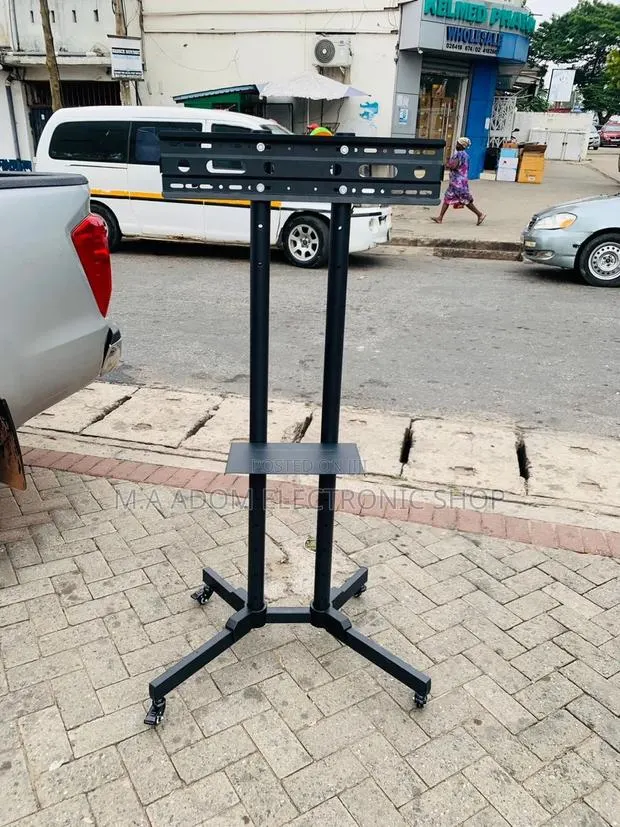 Long Lasting Mobile Tv Stand With Wheels for 32-70”(Black). · Photo 1