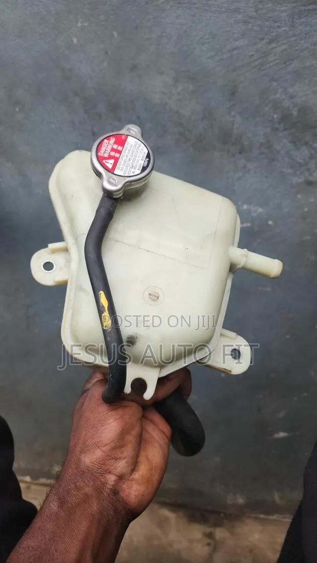 2017- 2022 Honda CR-V and Civic Radiator Coolant Reservoir (HO) · Photo 1
