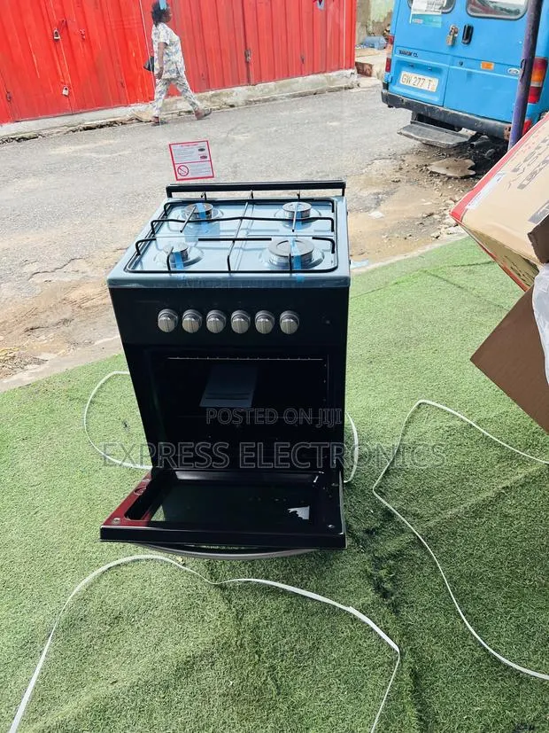 Grab the New Black Oven Volcano 4burner 50/50 · Photo 1