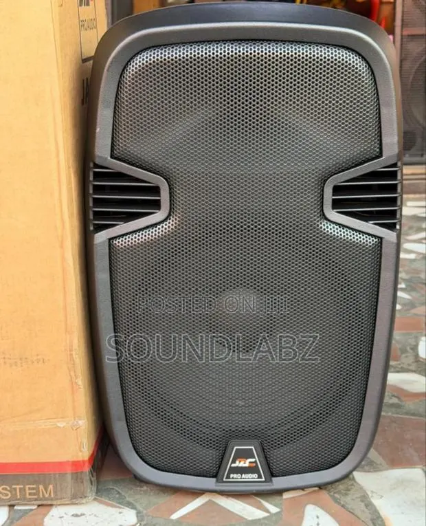 Jac 12inches Portable Bluetooth Speaker With Two Microphone and Stand · Photo 1