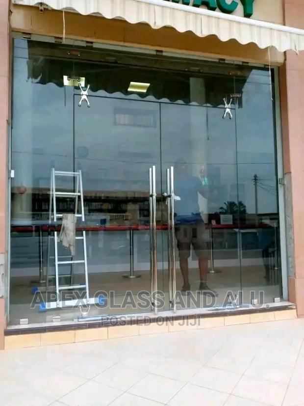 Frameless Swing Tempered Glass Doors · Photo 1