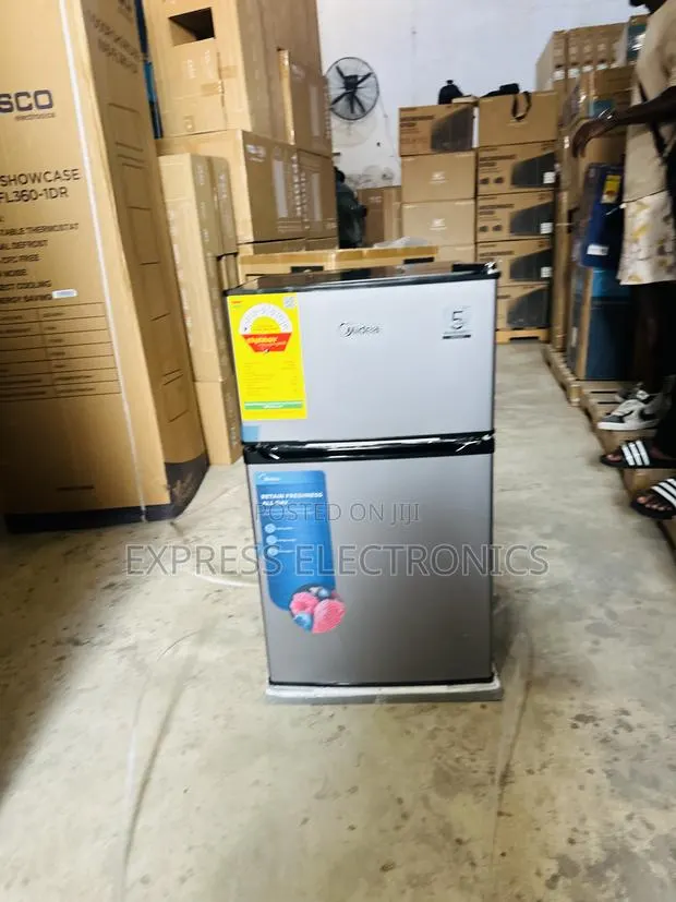 Available Now at Store Double Door Table Top Fridge Midea Dark Grey · Photo 1