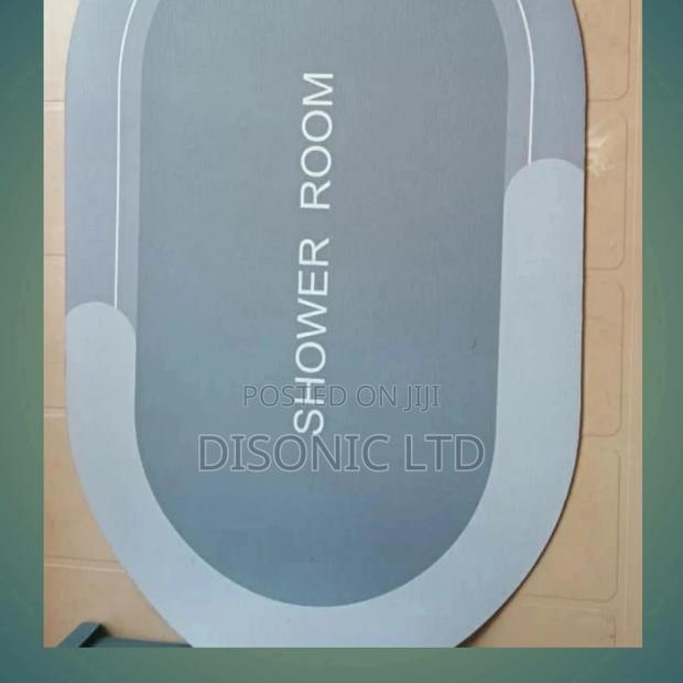 Water Absolvent and Antislip Bathroom Door Mats · Photo 4
