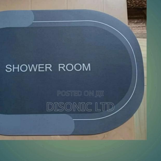 Water Absolvent and Antislip Bathroom Door Mats · Photo 5