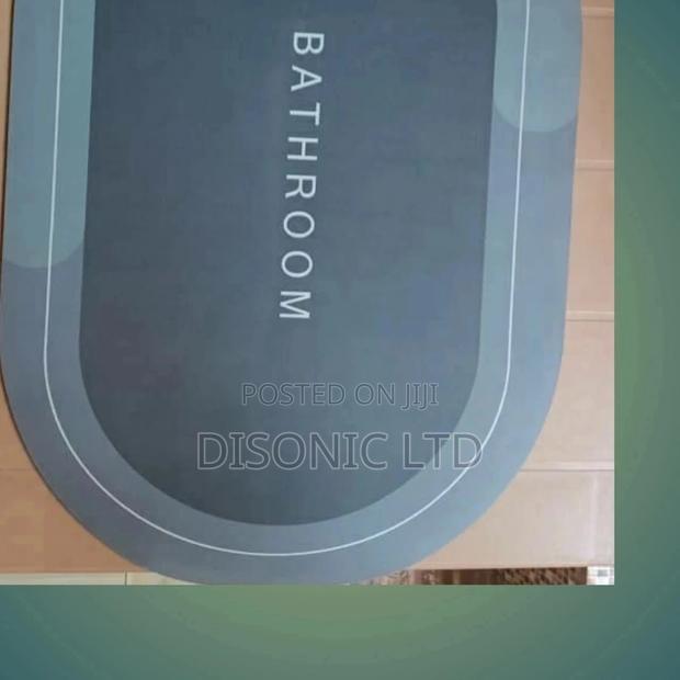 Water Absolvent and Antislip Bathroom Door Mats · Photo 6