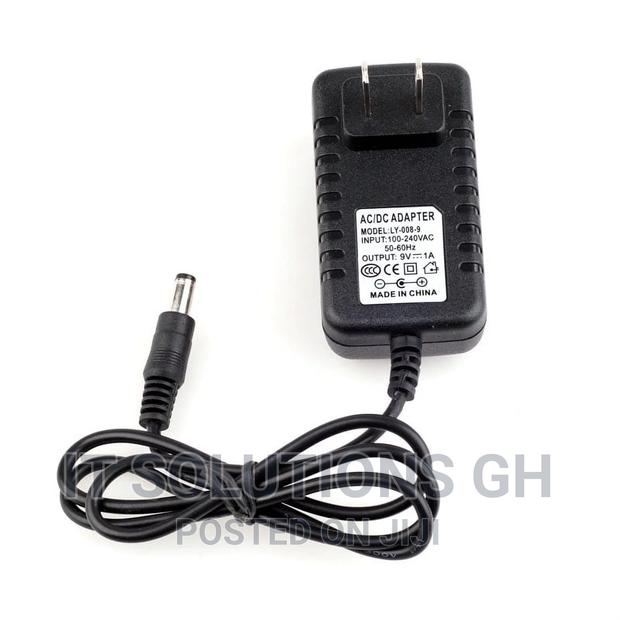 AC/DC 9V 1A Switching Power Supply Adapter · Photo 1