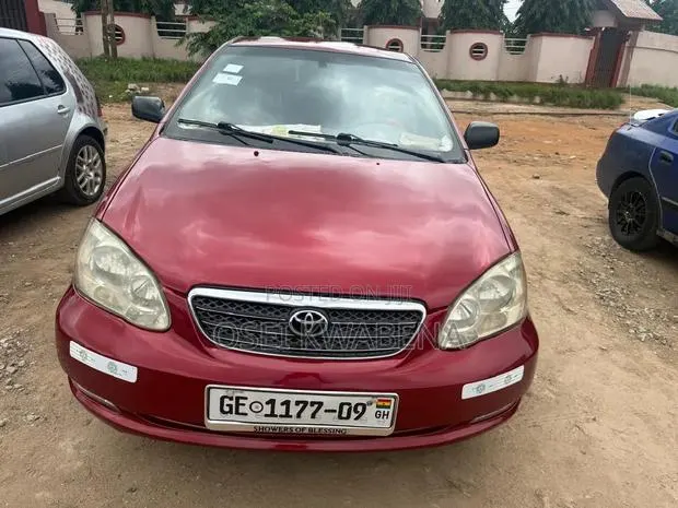 Toyota Corolla 2000 Red · Photo 1