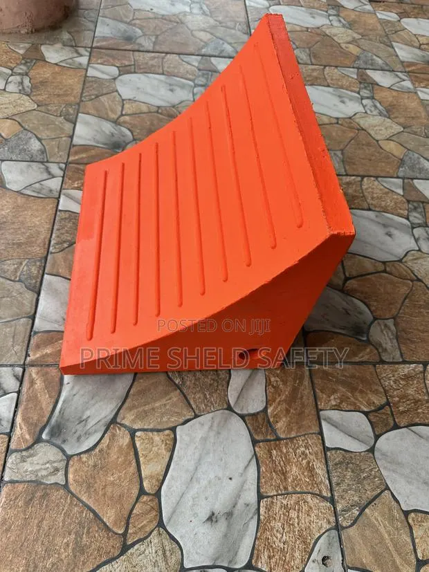 Heavy-Duty Rubber Wheel Chock · Photo 1