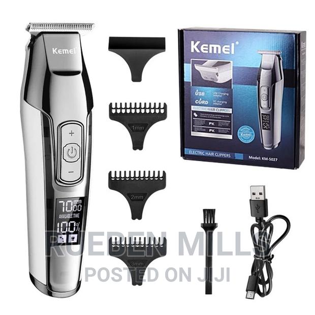 Rechargeable Silver Kemei Barbering Shaving Machine · Photo 1