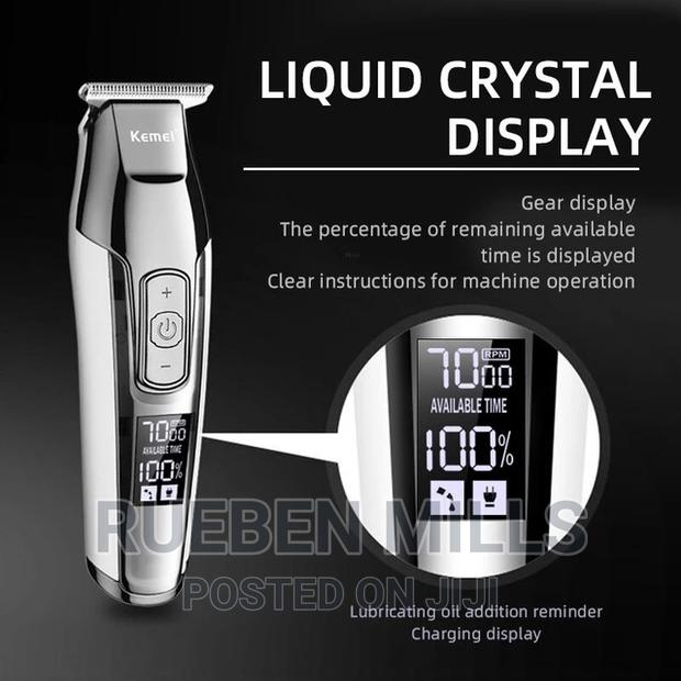 Rechargeable Silver Kemei Barbering Shaving Machine · Photo 3