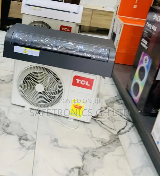 High Efficiency TCL 2.5hp R410 Inverter Aircon Grey Black Mirror Glass · Photo 1