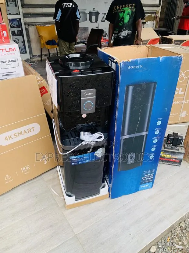 Ultra Sleek Black Midea Water Dispenser · Photo 1