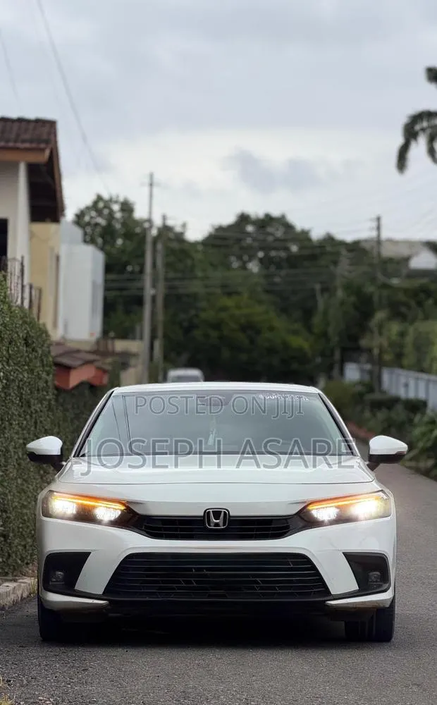 Honda Civic Touring CVT 2023 White · Photo 1