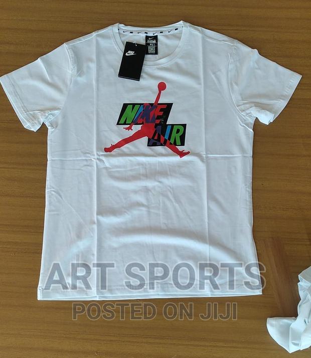 Nike Tops . · Photo 2