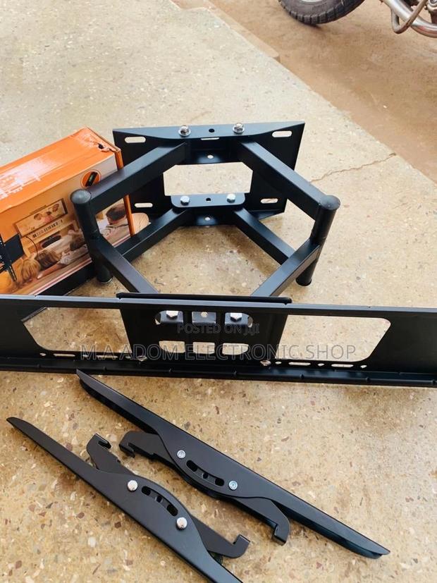 Newly in Stock Full Motion Adjustable Wall Mount(32”-70”). · Photo 1