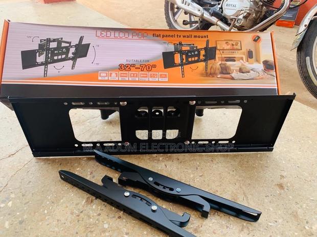 (32”-70”)Quality Full Motion Adjustable Wall Mount · Photo 1
