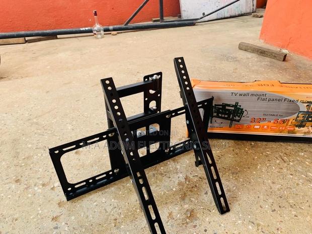 Quality Adjustable Corner Wall Mount for 32”-55” Tv · Photo 1